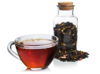 Isolated glass cup tea with tea jar