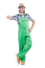 Young cheerful gardener in hat and green uniform isolated on