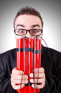 Businessman with dynamite isolated on white