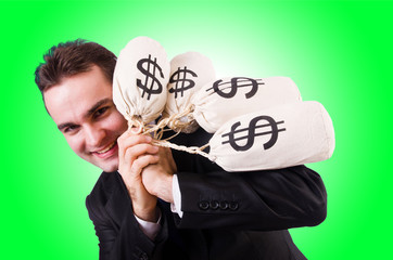 Man with money sacks on white