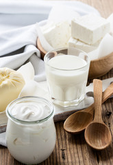 Dairy products on wooden table - obrazy, fototapety, plakaty
