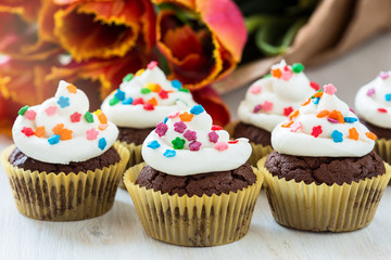 Mothers day  chocolate cupcakes  with spring tulips