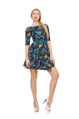 Woman in dark blue floral dress isolated on white