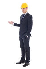 handsome business man or architect in yellow builder's helmet pr