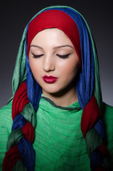 Portrait of the young woman with headscarf