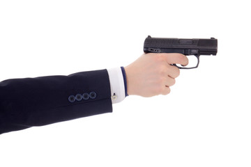 male hand in business suit holding gun isolated on white