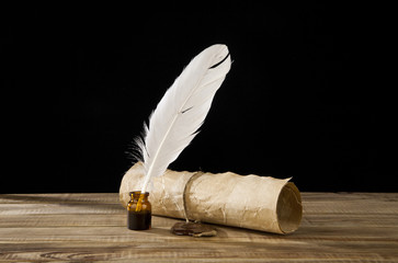 old paper and feather