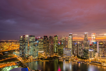 Fototapeta na wymiar Skysrapers in Singapore during night hours