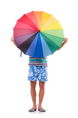 Positive man with colorful umbrella isolated on white