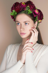 Young woman with flowers crown