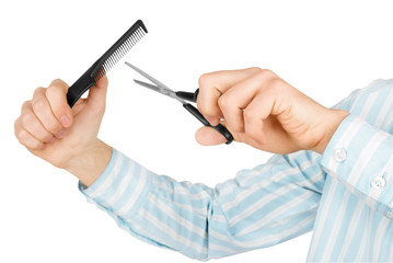 male hands holding scissors and comb on white