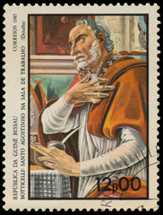 Stamp printed in Guinea-Bissau shows St. Augustine