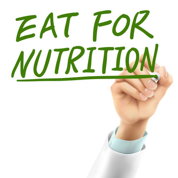 doctor writing eat for nutrition words