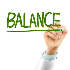 doctor writing balance word