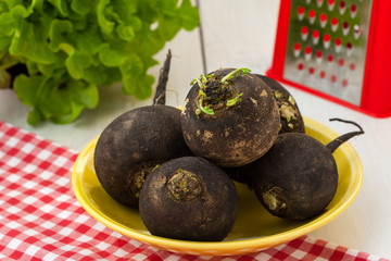 Plate full of black radesh bulbs