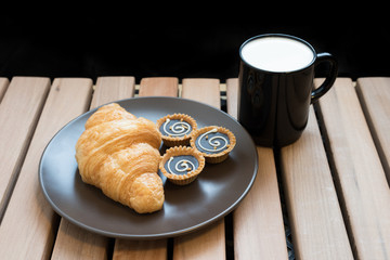 Croissant and milk.