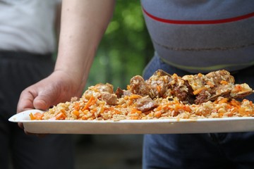 Riсe pilaw with meat on tray