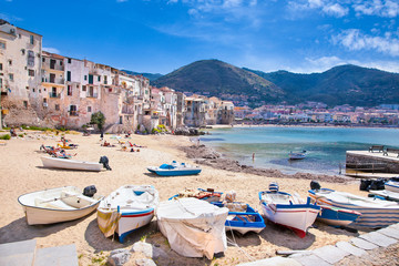 Wooden fishing boats on the old beach of Cefalu, Sicily