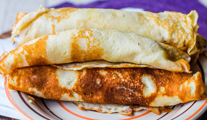 thin pancakes with mushrooms, onions and sour cream, Slavic kitc