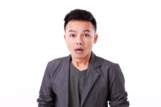 portrait of stunned, surprised man on white background