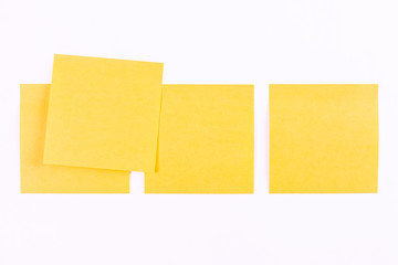 four yellow sticker on a white background