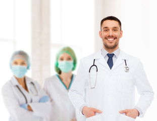 Fototapeta premium smiling male doctor with stethoscope