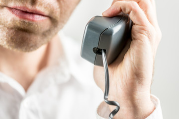 Listening to a telephone conversation