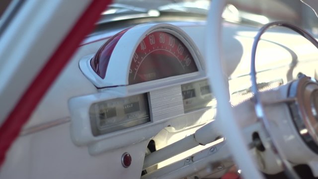 The dashboard and steering wheel of the boat