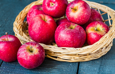 Naklejka na ściany i meble fresh red apples on a wooden board, fruits