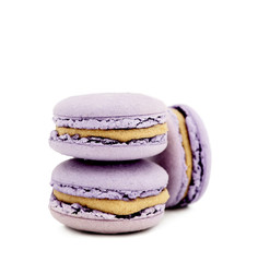 colorful macaroons over white background