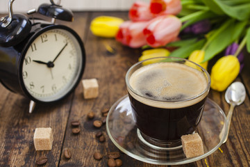 cup of coffee, hours and tulips