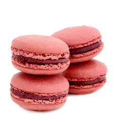 colorful macaroons over white background