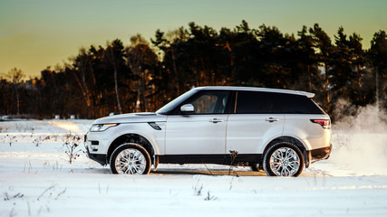 Powerful offroader car view on winter background © 31etc