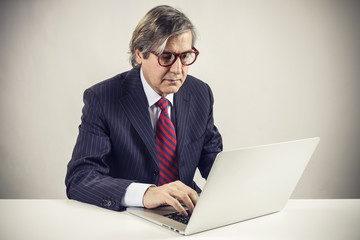 Businessman using a laptop pc