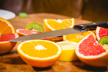 knife cuts the fruit salad