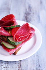 Sandwich with salami and cucumber