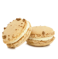 close up of colorful macaroons over white background