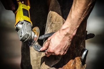 Blacksmith making horseshoes