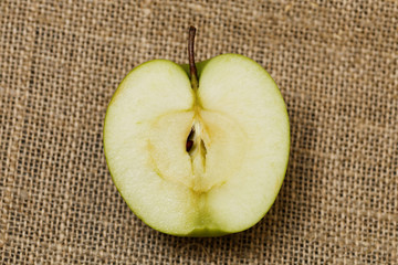 Half small green apple
