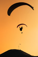 Paragliding on the sunset