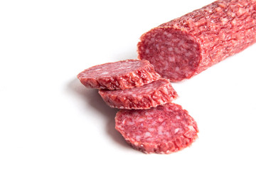 Sliced sausage on a white background