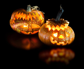 Halloween pumpkins on black background