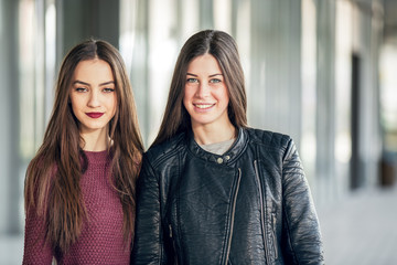 Two Teen Girl Friends Laughing. Selective focus