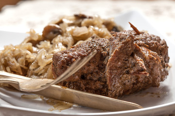 Beef roulade with cabbage.