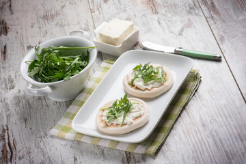 tigelle with stracchino and arugula