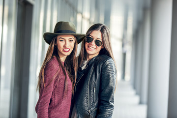 Two Teen Girl Friends Laughing. Selective focus