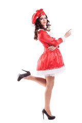 Beautiful and sexy woman wearing santa clause costume isolated