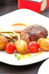 Prime grilled juicy beef steak with roasted vegetables