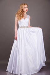 Fototapeta na wymiar Portrait of Beautiful Young Fashion Bride.bride in white wedding