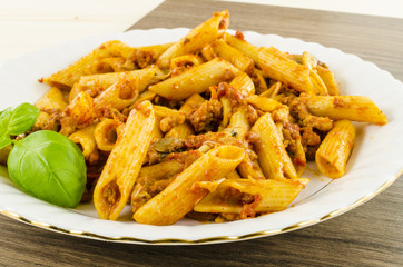 Pasta with mushrooms, minced meat and tomatoes